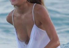 Nina Agdal Breast Slips Out During Beach Shoot