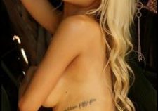 Blonde Busty Vixen Krystal Teases In A Very Skimpy String Bikini Outdoors