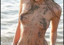 Brunette Maria Posing On The Beach