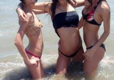 Girls Pose In Their Bikini On The Beach