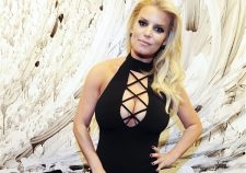 Jessica Simpson Tries To Cage Her Massive Tits