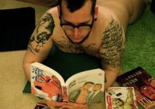 Nude Man Reading Book