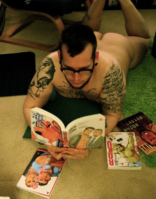 Nude Man Reading Book