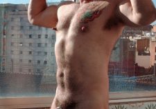 Nude Muscle Men Flexing Biceps