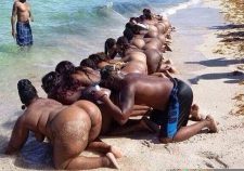 Pastor Kisses Women Butt On Beach