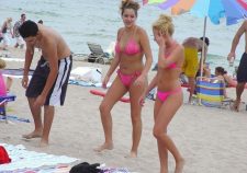 Pink Bikini Babes Walking On Hot Beach Sands