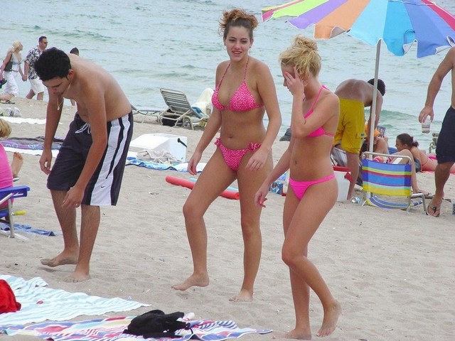 Pink Bikini Babes Walking On Hot Beach Sands