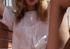 Pretty Blonde Flashing Her Shaven Pussy