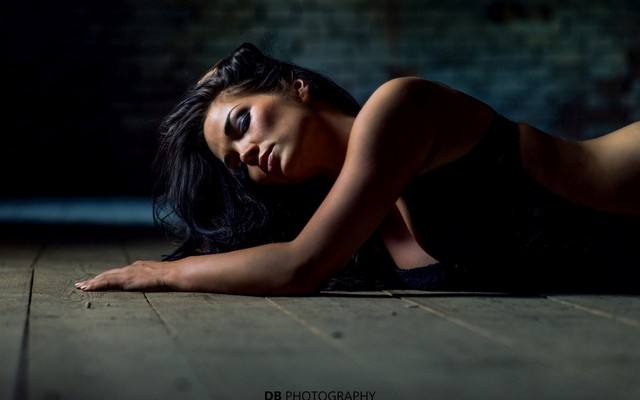 Black Brea Girl On Wooden Floor Low Light Room